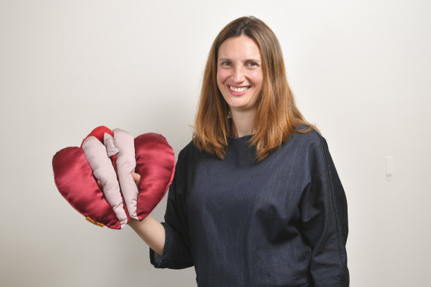 Occupational therapist Anita Brown-Major and her satin vulva puppet, which she uses in teaching.