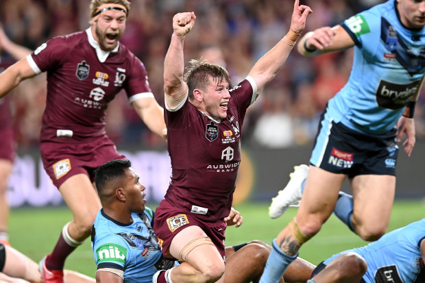 Harry Grant of the Maroons celebrates a try in Origin III.