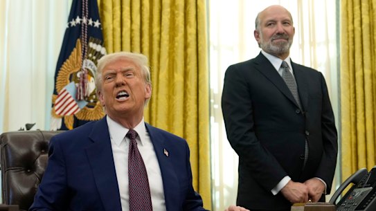 US Commerce Secretary Howard Lutnick with President Donald Trump in the Oval Office last month.