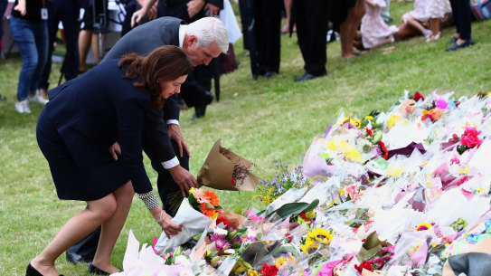 Premier Annastacia Palaszczuk and MP Joe Kelly lay flowers during Sunday's public memorial.