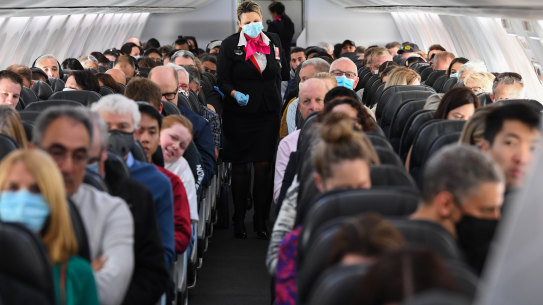 Qantas is seeing if it can operate its busiest route with four cabin crew instead of five as it undergoes an exhaustive search for savings. 