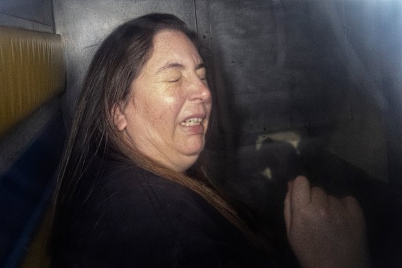 Erin Patterson in the back of the prison van on May 12.