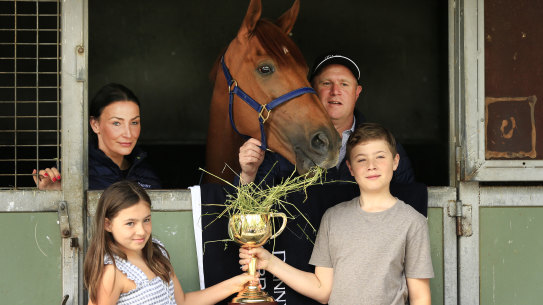 Trainer Danny O'Brien and his family - wife Nina and kids Grace and Thomas - pose with Vow And Declare after his Melbourne Cup win last year.