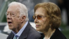 Rosalynn and Jimmy Carter pictured at an NFL football game in 2018.