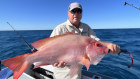 MinRes founder and fishing enthusiast Chris Ellison with a red emperor.