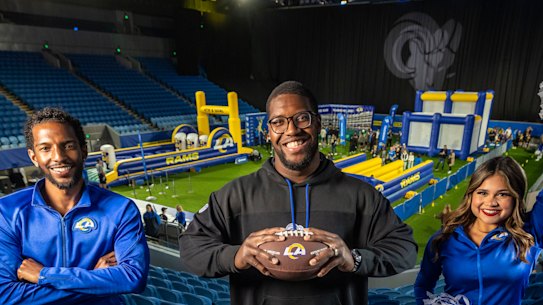 Full of cheer: LA Rams defensive end Kobie Turner was at Margaret Court Arena on Sunday, spreading the NFL word ahead of next year’s historic clash at the MCG.