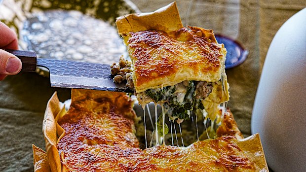 Three-cheese lasagne with overhanging edges for extra crispy bits.