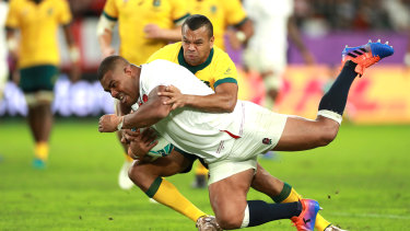 Kurtley Beale tackles Kyle Sinckler during Australia’s World Cup quarter-final loss to England in 2019. 