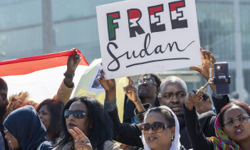People demonstrate at a solidarity rally for Sudan at the Place des Nations in front of the European headquarters of the United Nations in Geneva on Friday.