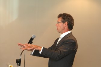 Norman O’Bryan addresses Banksia Securities investors in 2013.