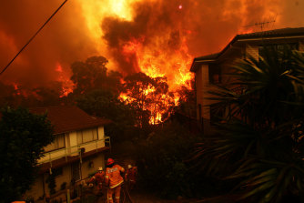 Fires threaten homes in Umina on the state's Central Coast this month.