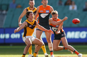 Harry Perryman gets a handball away against the Giants.