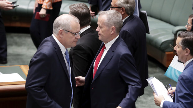 Prime Minister Scott Morrison and Opposition Leader Bill Shorten cross paths during a tense final sitting day of the year. 