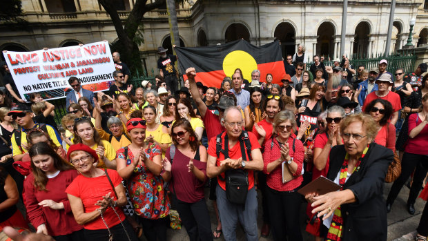 Wangan and Jagalingou traditional owners and their supporters protesting outside Parliament House in Brisbane in March last year. 