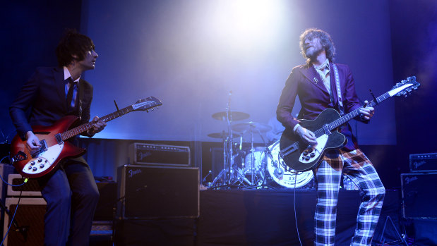 Davey Lane, left, and Tim Rogers of You Am I on stage at Melbourne's Forum Theatre in July 2013.