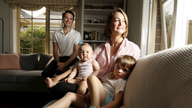 Kate Percy with her husband Adam and their children Genevieve, 10 months, and Lleyton, 3, decided not to wait to switch insurers  as reforms meant to make it easier to compare policies appear not to be working