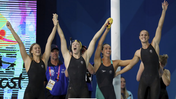 The Australians celebrate their record-breaking win.
