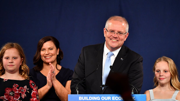 Prime Minister Scott Morrison with wife Jenny and children Lily, left, and Abbey, as he claimed victory.