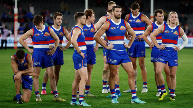The Western Bulldogs look dejected after a loss during the round 5 match against the Essendon Bombers.