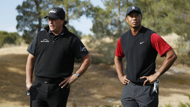 Money for jam: Phil Mickelson and Tiger Woods during The Match last year.