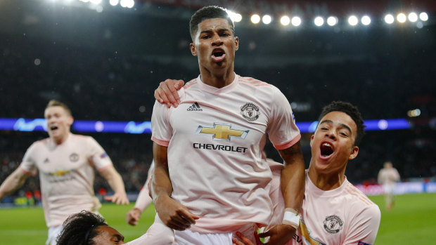 Marcus Rashford celebrates Manchester United's third goal against Paris-St Germain.