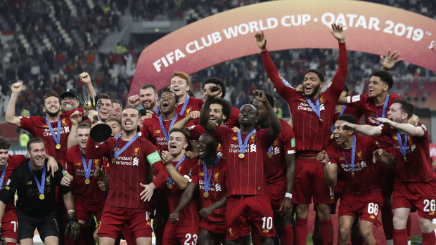 Liverpool celebrate winning the Club World Cup after beating Flamengo in the final at Khalifa International Stadium.