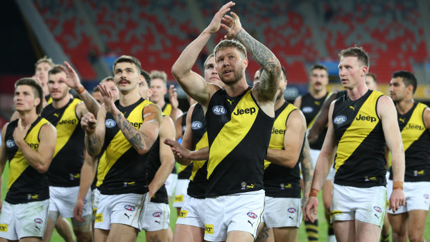 A victorious Richmond leave the Gold Coast ground.