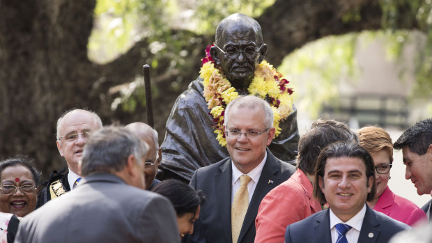 Mayor of Parramatta Andrew Wilson (far left, obscured) and Prime Minister Scott Morrison at the unveiling of a statue of Mahatma Ghandi at Jubilee Park in Parramatta in November 2018. Cr Barrak is in the foreground. 