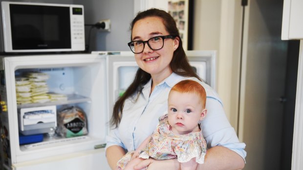 Penny Pearce, who has donated about 18 litres of breast milk - enough to feed 400 babies, with her daughter Vivian.