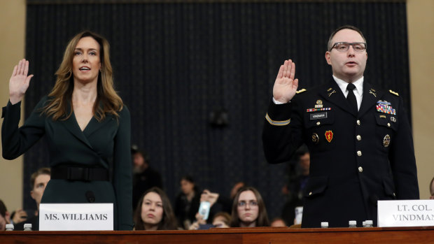Jennifer Williams, an aide to Vice-President Mike Pence, left, and National Security Council aide Lieutenant Colonel Alexander Vindman, both listened in on the infamous phone call between Trump and his Ukrainian counterpart. 