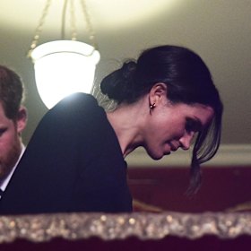 Side Bun alert! Prince Harry and Meghan Markle take their seats at the Royal Albert Hall in London for a  concert to celebrate the Queen's 92nd birthday
