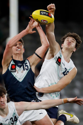 Oscar Murdoch (right) spoils Harry Sheezel at the state championship at Marvel Stadium in September.