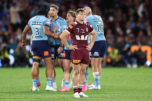 Harry Grant of the Maroons looks dejected after game one.