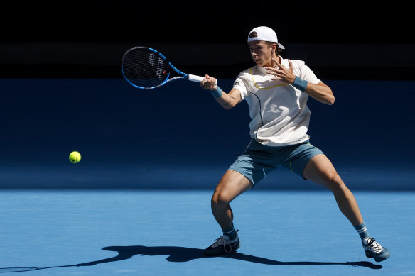 Arthur Cazaux plays a forehand against Hubert Hurkacz.