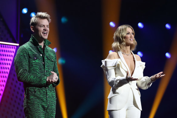 ARIA Awards hosts Joel Creasey and Delta Goodrem. 