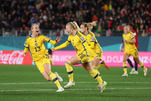 Rebecka Blomqvist celebrates Sweden’s goal.