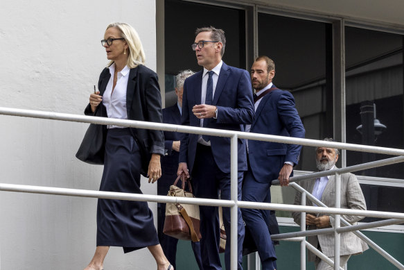 Elisabeth Murdoch (left) and James Murdoch (centre) arrive for the second day of probate court hearings in Reno, Nevada, in September.
