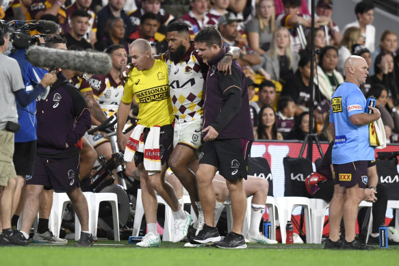 Payne Haas is helped from the field in the Brisbane Broncos’ triumph of the Manly Sea Eagles in Magic Round.