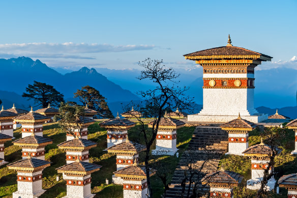 Chortens at Dochula Pass; the Himalayas in the distance can be seen on a clear day.