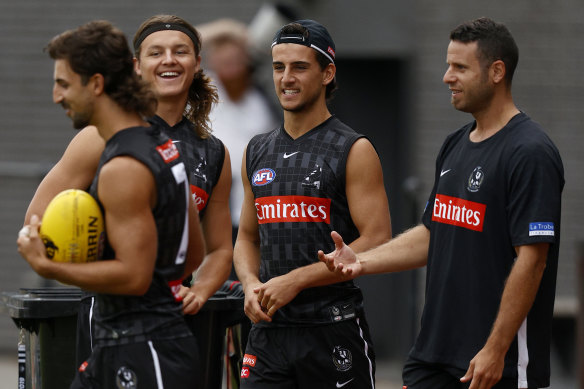Nick Daicos (second from right) at Collingwood training on Wednesday, ahead of his senior debut on Friday night.