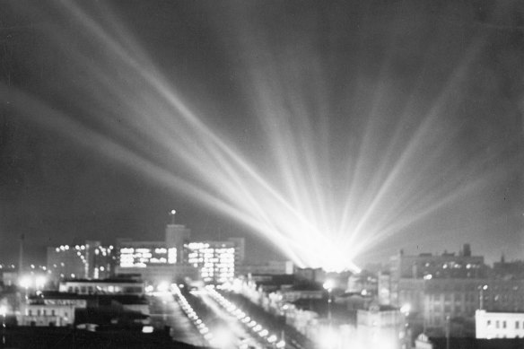 Search lights create a flare of light over Melbourne in 1945.