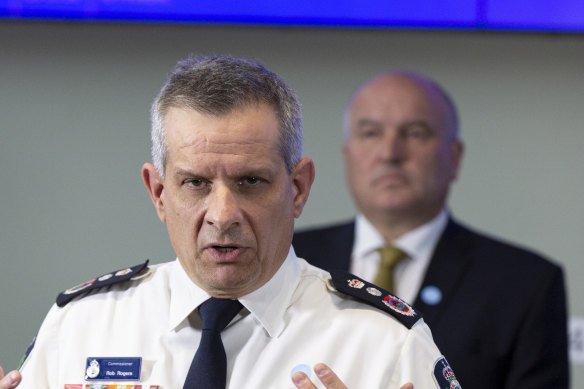 RFS Commissioner Rob Rogers (front) and Emergency Services Minister David Elliott at a media event to release the inquiry's report.