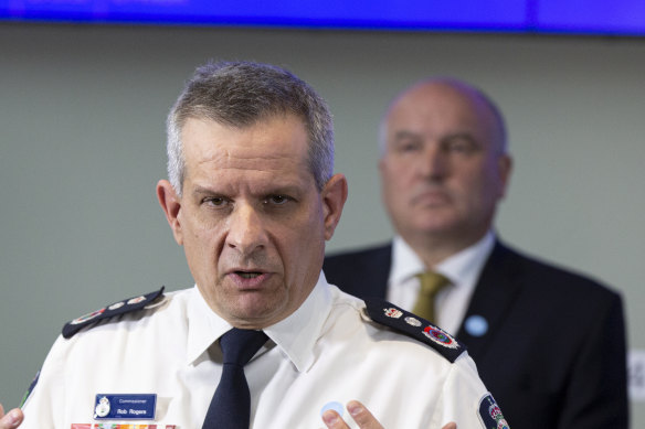 RFS Commissioner Rob Rogers, with Emergency Services Minister David Elliott in the background.