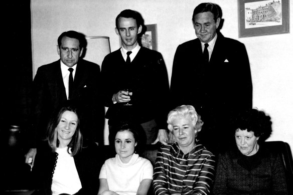 Then prime minister John Gorton and his family watch the broadcast of a Gorton speech on October 13, 1969, with Tony Eggleton (standing, left) and Ainsley Gotto (seated, second from left). Gorton’s wife Bettina is seated third from left.