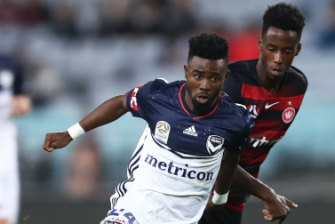 Victory's Elvis Kamsoba (competing against the Wanderers' Bruce Kamau) lived in a Tanzanian refugee camp, where his family built a house out of wood and mud.