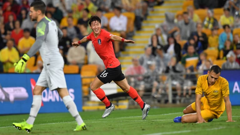 Sucker punch: Hwang Ui-jo celebrates after hitting Australia on the counter in clinical fashion.