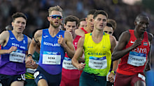 Australia’s Cameron Myers racing world record holder Josh Kerr in the men’s mile final at the Commonwealth Games.