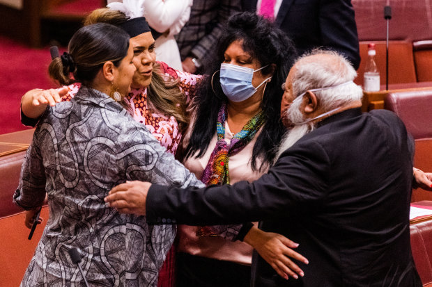 After her first speech in the Senate in July, Jacinta Price (second from left) is embraced by (from left) Labor senators Jana Stewart, Malarndirri McCarthy and Pat Dodson.