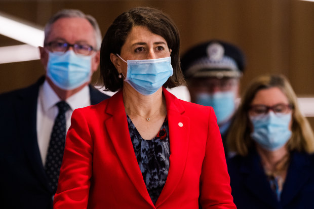 Premier Gladys Berejiklian, Health Minister Brad Hazzard, Chief Health Officer Dr Kerry Chant and Police Deputy Commissioner Gary Worboys after a COVID-19 briefing. Lockdown communities say there needs to be more consultation.
