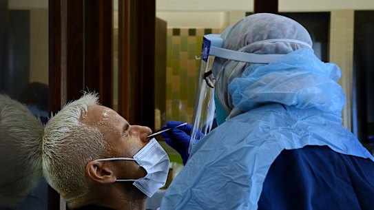 St Vincent’s Hospital staff conduct COVID-19 tests at their clinic in Darlinghurst on Thursday.